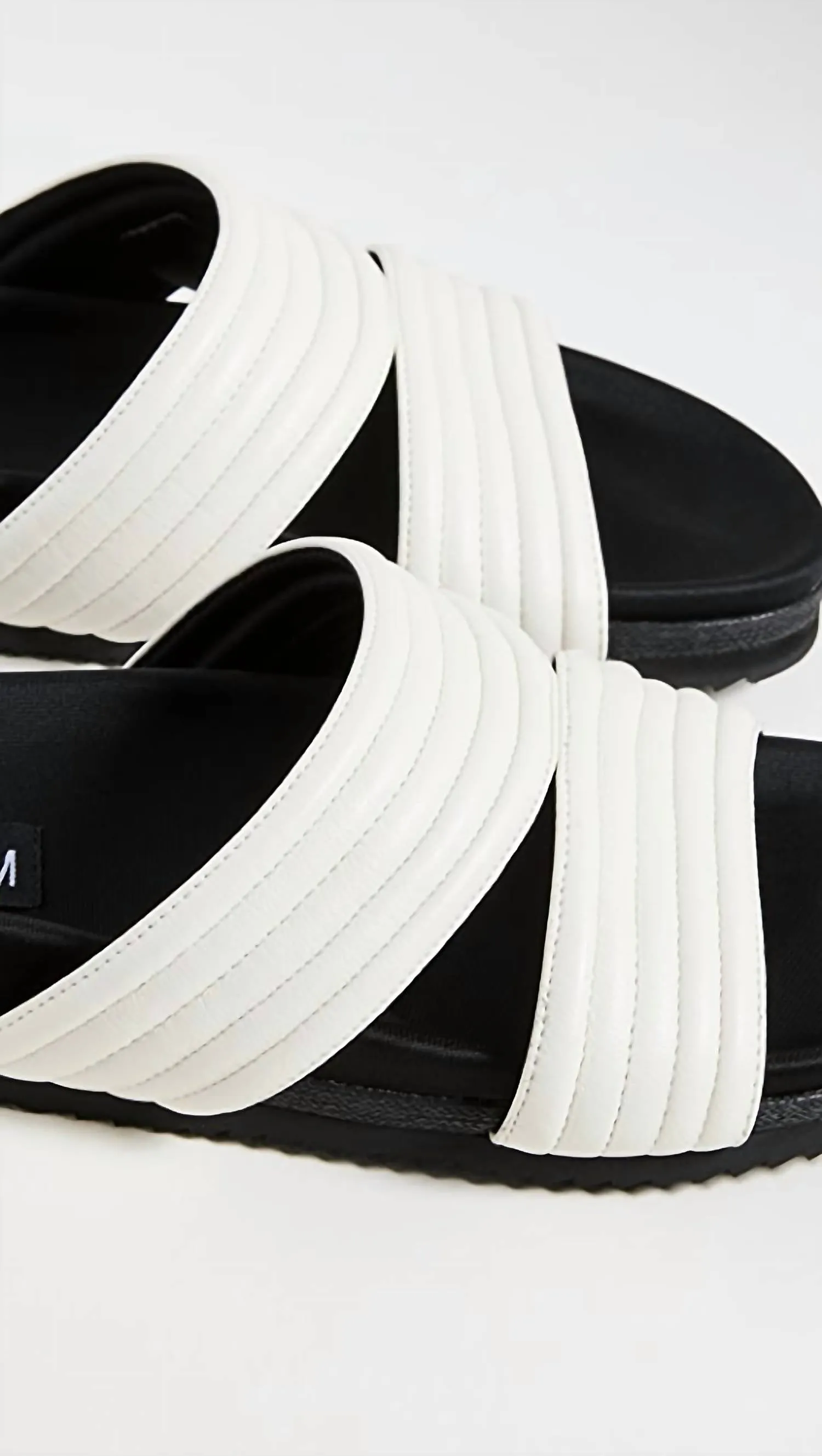 Crescent Quilt Slides In White